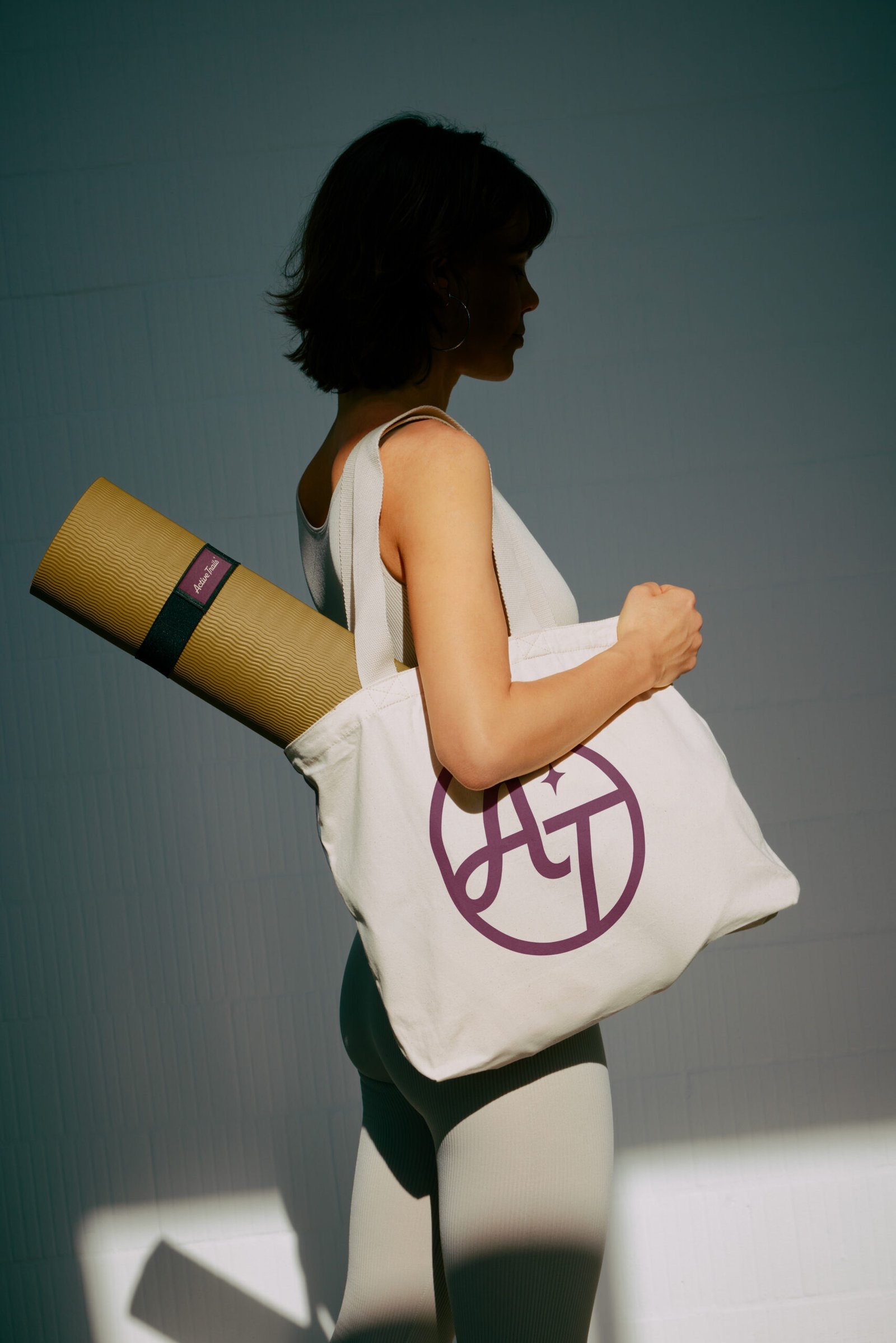 Active Trails tote bag and yoga mat worn outdoors