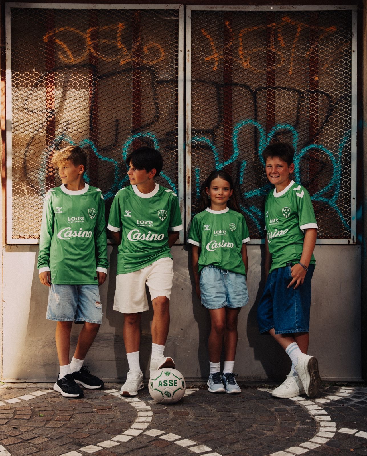 Family with a ball in the street, ASSE jerseys