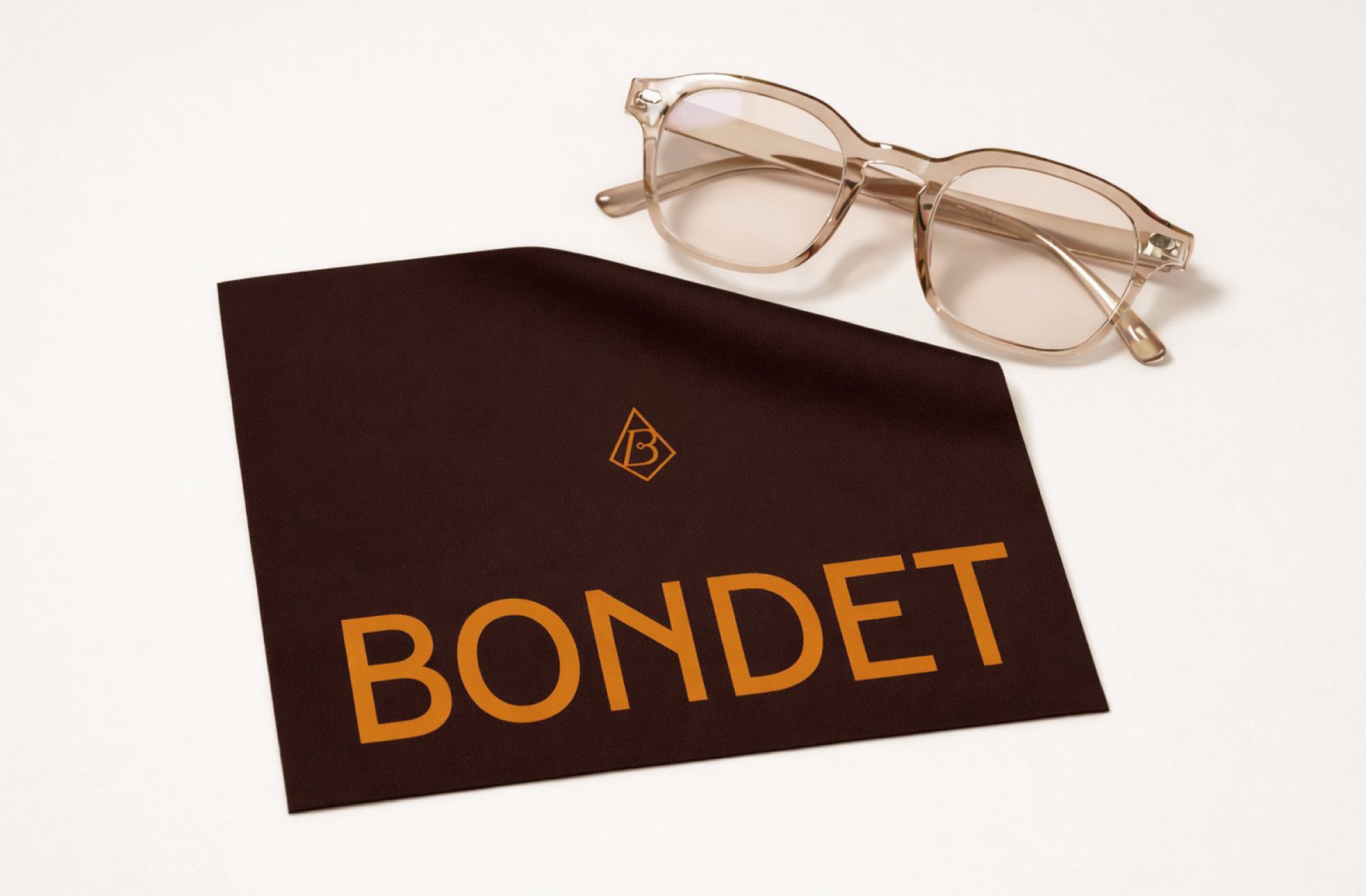 Glasses resting on a Bondet cleaning case