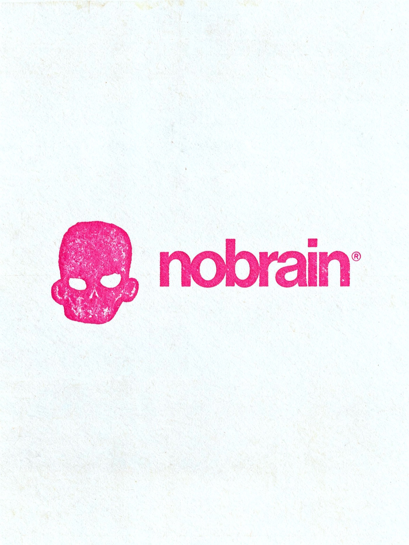 Nobrain logo with an inked stamp effect
