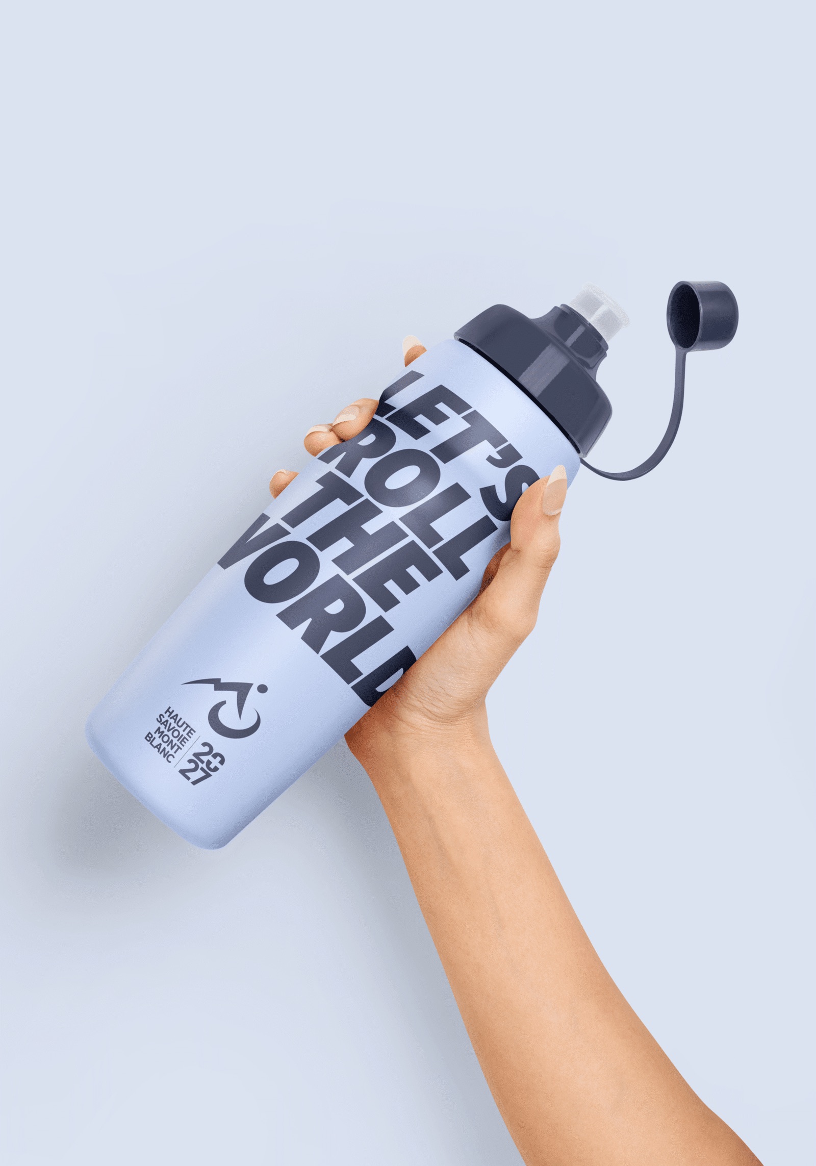 Water bottle with the message "Let's roll the world" on a blue background